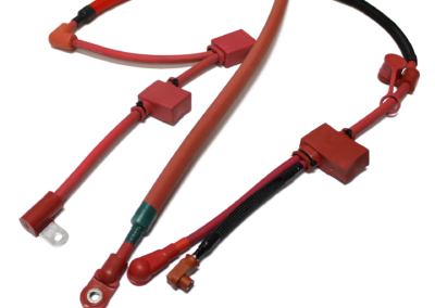 • Many routing and technology options to satisfy your application requirements • Over-molded terminals, tees, multiple wires, elbows, maintenance free, lead • 100% Engineering Support • If you imagine it…we can make it Highly Complex Battery Cable Made by Kalas with protective coverings, lugs, terminals, led molded terminals, boots, elbows, single and double wire configurations.
